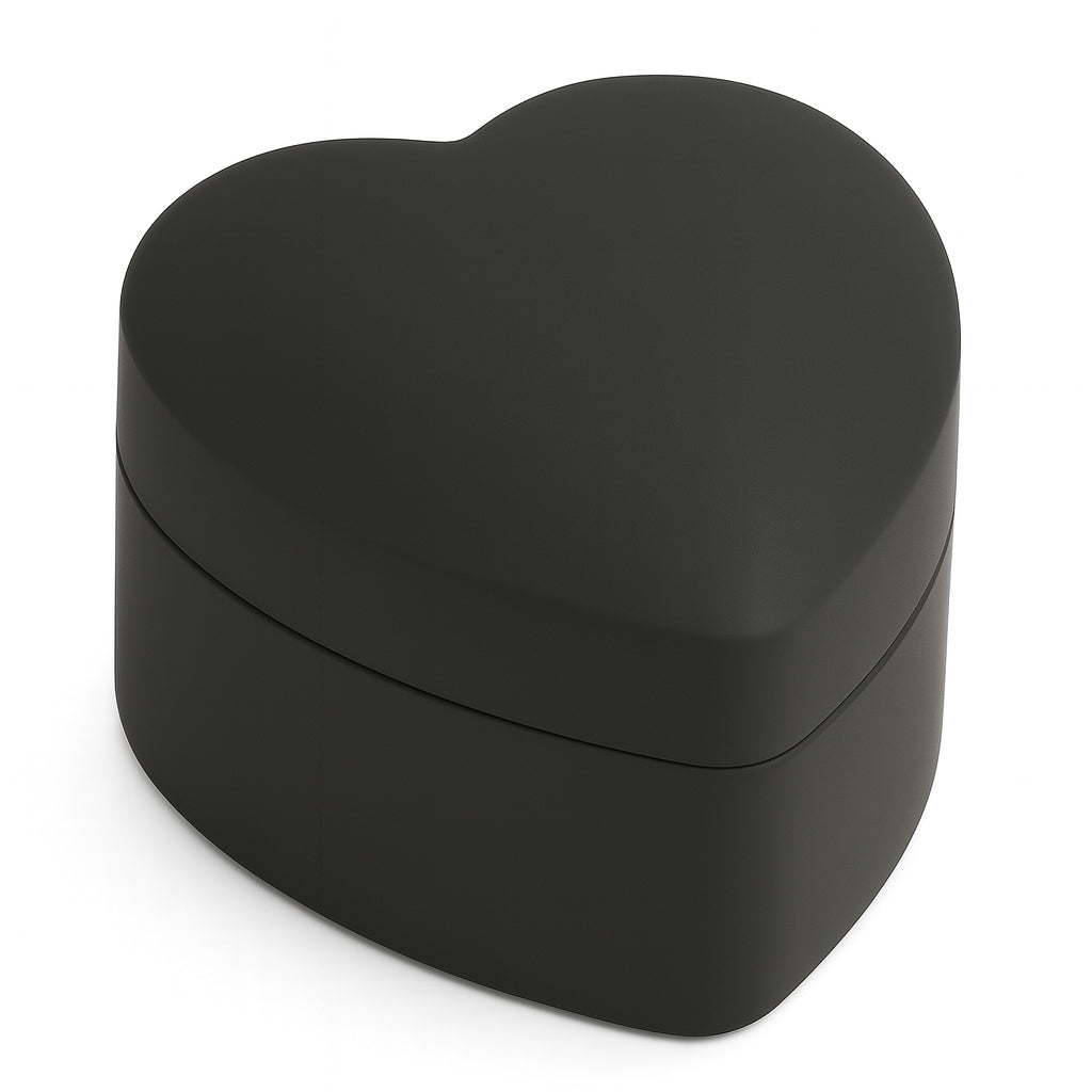 Closed black heart shaped ring box