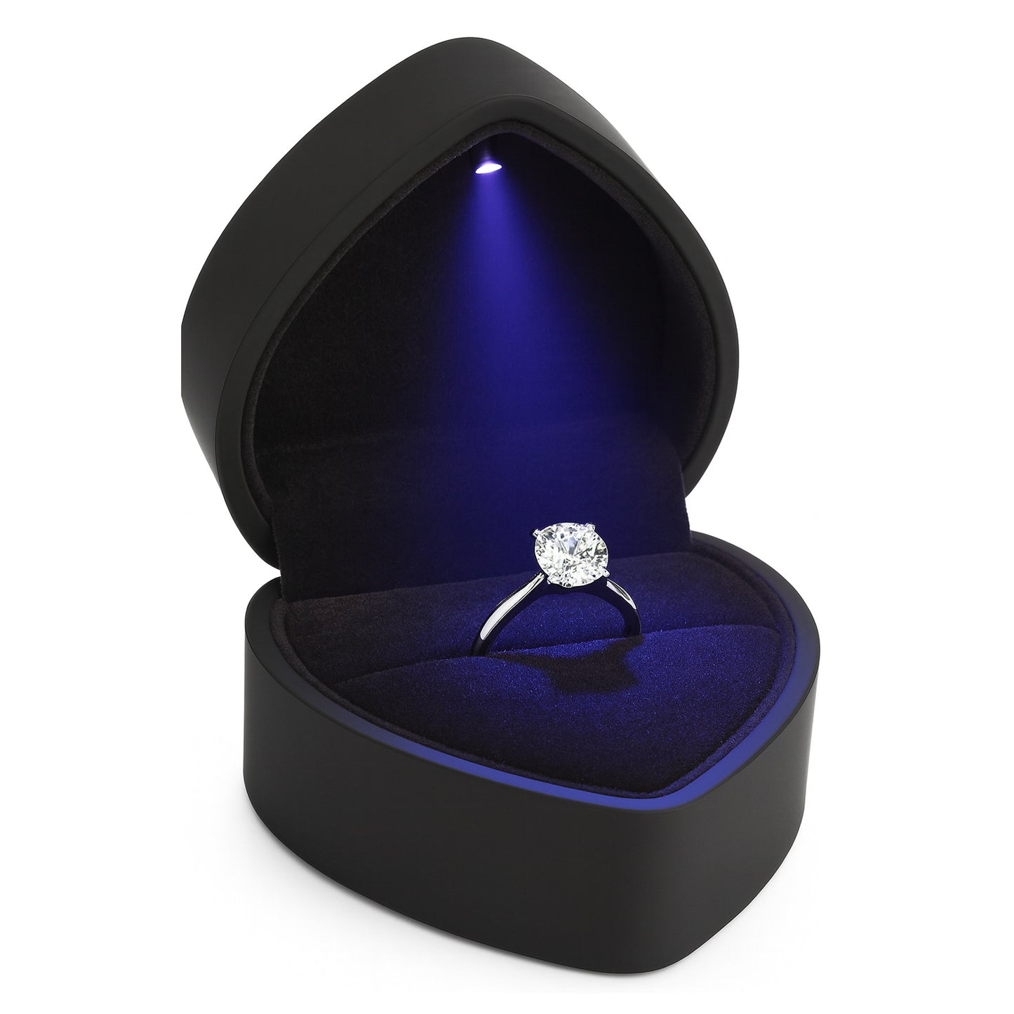 Black heart shaped ring box with LED light holding diamond engagement ring