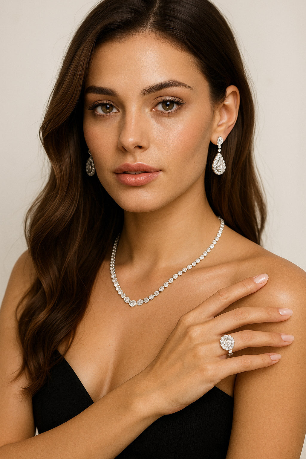 Model wearing diamond engagement ring necklace and earrings